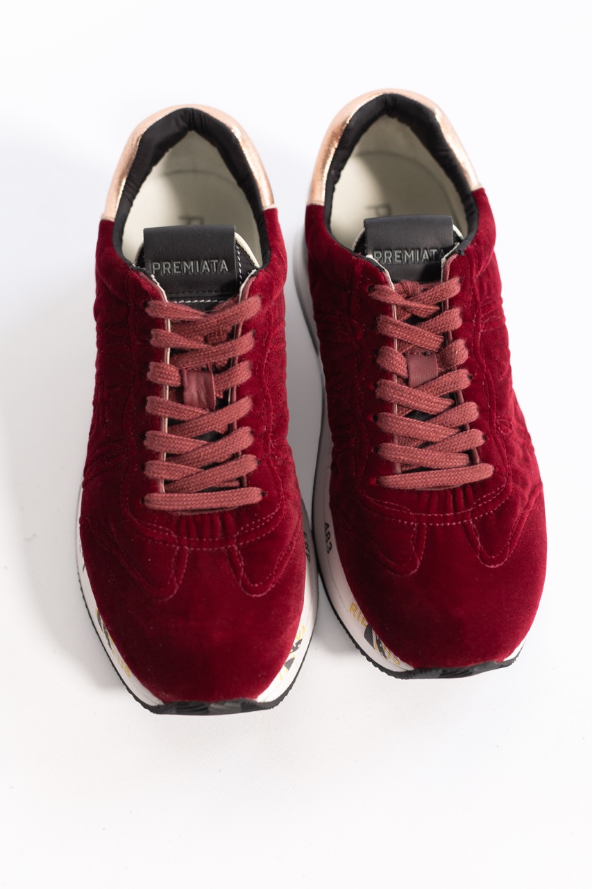 картинка Кроссовки PREMIATA бархатные бордовые от магазина Одежда+