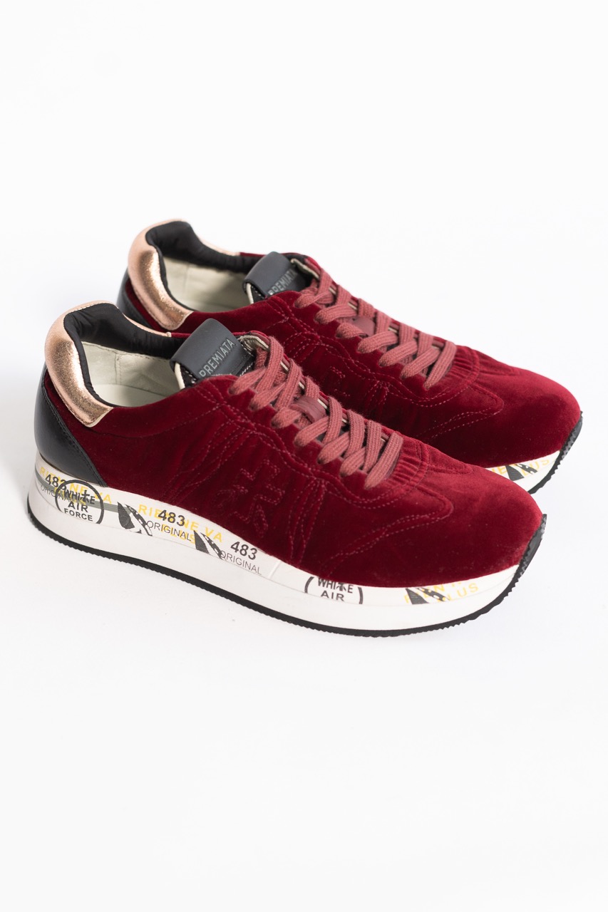 картинка Кроссовки PREMIATA бархатные бордовые от магазина Одежда+